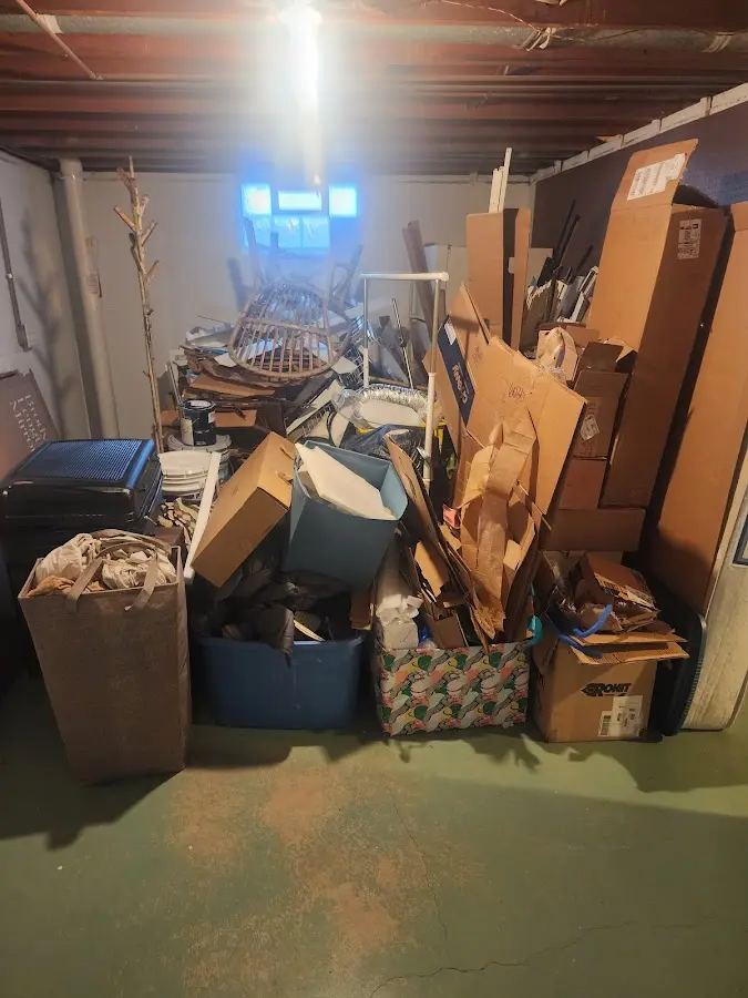 Roll-off dumpster container at job site for Concrete Dumpster Rental in Winona